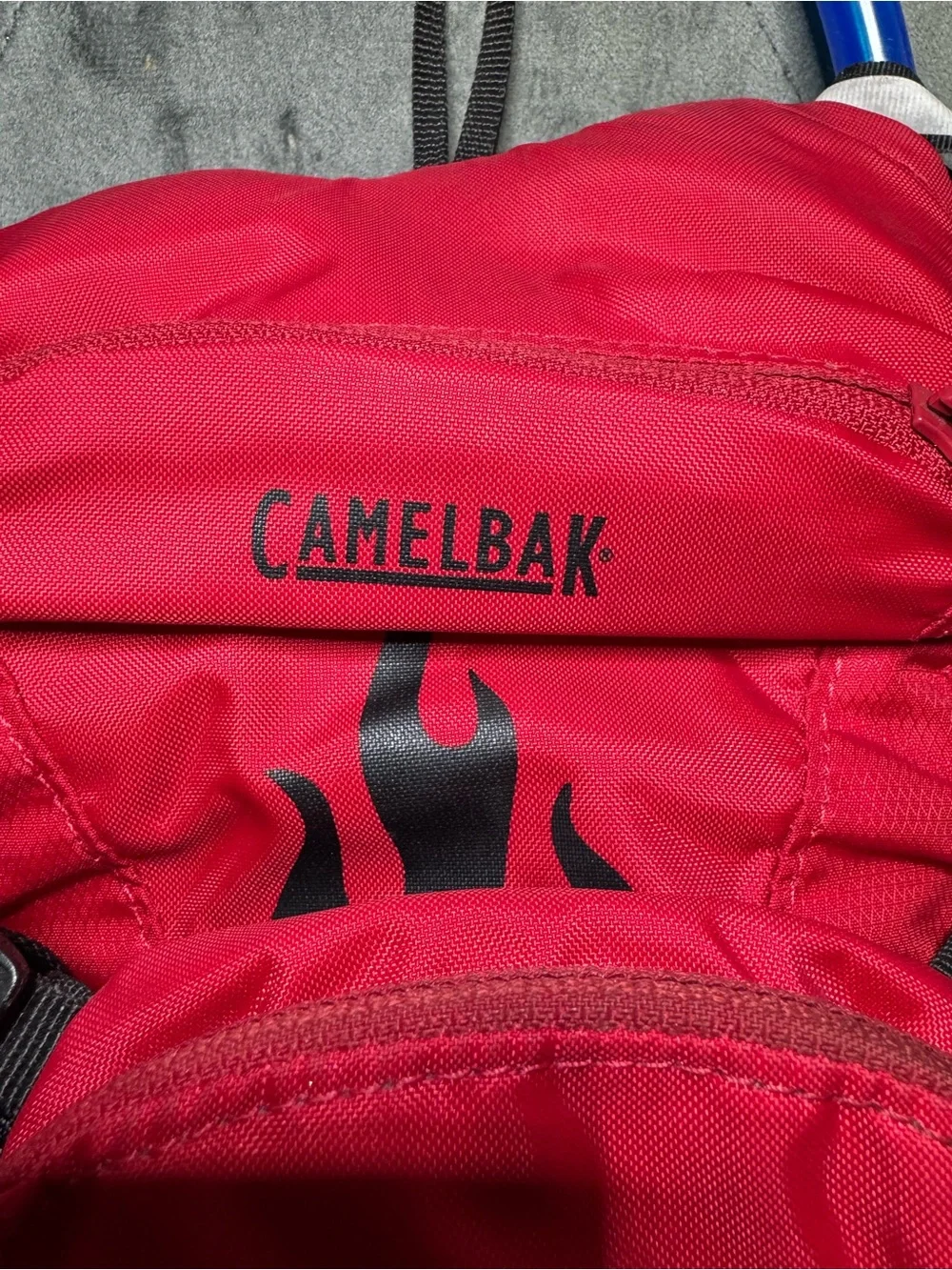 CamelBak Mini M.U.L.E. Kids’ Hydration Red Backpack with Black Flame Graphic